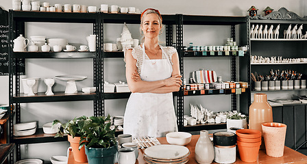 Image showing Happy woman, portrait and pottery with arms crossed in small business confidence for crafting in retail store. Confident female person, ceramic designer or owner smiling for craft or creative startup