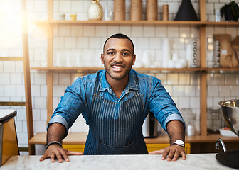 Image showing Coffee shop, counter and portrait of black man in restaurant for service, working and welcome in cafe. Small business owner, barista startup and happy male waiter smile in cafeteria ready to serve