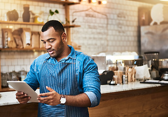 Image showing Search, tablet and manager with man in cafe for online, entrepreneurship and startup. Waiter, technology and food industry with small business owner in restaurant for barista, network and coffee shop