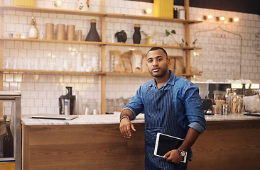 Image showing Waiter, tablet and portrait of man in cafe for online, entrepreneurship and startup. African, technology and food industry with small business owner in restaurant for barista, manager and coffee shop