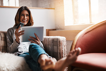 Image showing Thinking, tablet and credit card with an ecommerce woman on a sofa in the living room of her home. Online shopping, finance and fintech banking with a young female online customer in her house