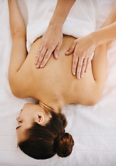 Image showing Back, beauty and massage with woman in spa for wellness, luxury and cosmetics treatment from above. Skincare, peace and zen with female customer and hands of therapist for therapy, salon and detox