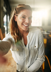 Image showing Selfie, smile and woman in a coffee shop, relax and cheerful with confidence, happiness and joyful. Portrait, female person and happy lady with social media, cafe and restaurant with beauty and break