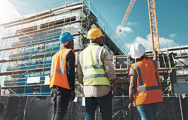 Image showing Construction, engineer team and building project with people planning development and architecture. Black woman and men together for project management, engineering and assessment outdoor in city