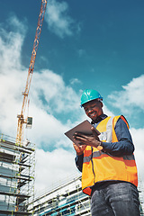 Image showing Engineer man, construction and a tablet for project management, development and architecture. Happy African male contractor with mobile app for engineering and safety inspection or planning outdoor