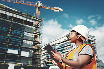 Image showing Engineer woman, construction and tablet outdoor for building development and architecture. Black female contractor with planning app for project management, engineering and safety inspection in city