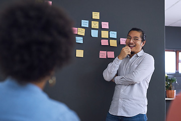 Image showing Meeting, brainstorming and planning with team, man speaker, sticky note and leadership in presentation. Collaboration, people in strategy workshop at startup, ideas with presenter and audience