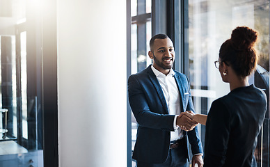 Image showing Hand shake, man and woman in hallway for welcome, b2b collaboration or business meeting with respect. Businessman, partnership and shaking hands for human resources, hiring or greeting in workplace