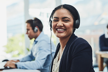 Image showing Business woman, call center and portrait smile with headphones in customer service, support or telemarketing at office. Happy female consultant agent smiling for online advice or help in contact us