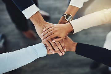 Image showing Hands together, business people and solidarity with top view, support and team huddle with collaboration. Group of employees working in office, teamwork and mission with workforce and hand stack