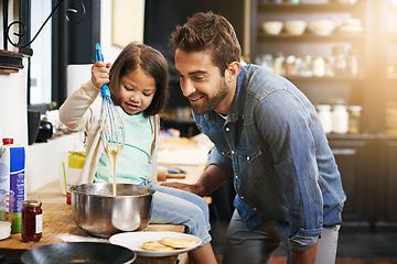 Image showing Cooking, smile and father with daughter in kitchen for pancakes, bonding and learning. Food, morning and helping with man and young girl in family home for baking, support and teaching nutrition