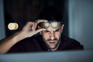 Image showing Night, confused businessman work in glasses and shock, angry or frustrated with screen, online communication or 404 error. Man, face and reading eyewear or late working with stress, computer and fail