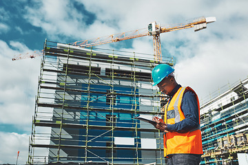 Image showing Engineer, construction and a man with a tablet for project management, development and architecture. Black male contractor with mobile app for engineering and safety inspection or planning outdoor