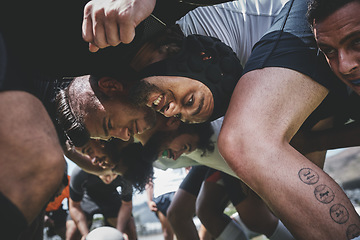 Image showing Fitness, rugby and team in a scrum on a field during a game, workout or training in a stadium. Sports, performance and group of athletes in position on an outdoor pitch for a match or practice.