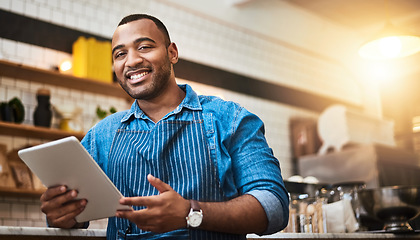 Image showing Happy, tablet and portrait of man in cafe for online, digital and african startup. Network, technology and food industry with small business owner in restaurant for barista, waiter and coffee shop