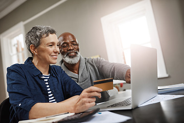 Image showing Credit card, laptop and senior couple for online shopping, ecommerce and fintech payment for home insurance. Finance, pension or financial investment of biracial woman and partner on computer banking