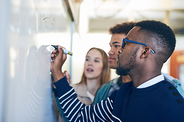 Image showing Diversity, students writing on whiteboard and in classroom of school building. Problem solving or formula, brainstorming or presentation and people write on board in class of college or university