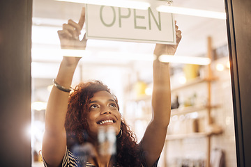 Image showing Open, sign and happy woman at window of shop, store and notice of retail shopping time, board and welcome. Small business owner, female worker and advertising opening information to start services