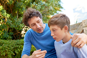 Image showing Family, father talking with son in backyard, bonding with love and care, communication and relationship. Man with sad teen boy, help with advice at home and outdoor together with trust and support