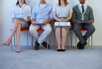 Image showing Legs, recruitment and business people in line for job interview, hiring and waiting in a room. Human resources, meeting and candidates in a row in office for onboarding process at a startup company