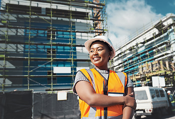 Image showing Engineer, construction and a black woman thinking outdoor at building site for development and architecture. Female contractor happy for project management, engineering and equal opportunity in city