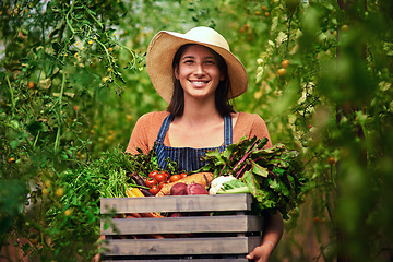 Image showing Farmer, agriculture and portrait of woman with crate on farm after harvest of summer vegetables. Farming, female person and smile with box of green product, food or agro in nature for sustainability