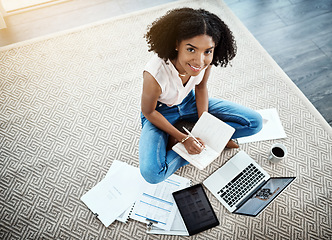 Image showing Laptop, notebook and woman on floor for work from home opportunity, financial planning and writing ideas from above. African person on computer, brainstorming and budget documents for happy startup
