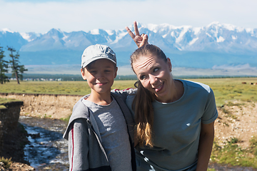 Image showing Woman and her son taking photo