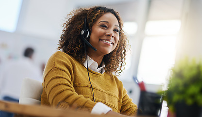 Image showing Happy african woman, call center agent or listen on voip headset for consulting, communication or contact. Girl, customer service or tech support crm with smile, headphones or microphone at help desk