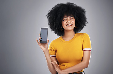 Image showing Technology, portrait of black woman with smartphone screen and in background. Communication or social media, networking and happy African female with cellphone for advertisement in studio backdrop