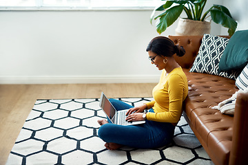 Image showing Floor, computer and woman in work from home, studying and e learning and college education website. Relax, living room carpet and person or student typing on laptop, internet or elearning application