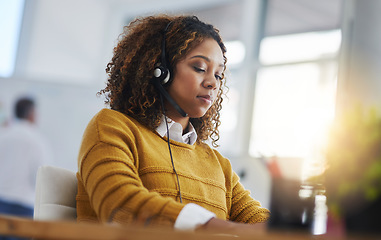 Image showing Virtual assistant, chat or girl typing in call center consulting online at customer services help desk. Crm, computer or biracial woman consultant in telemarketing or telecom company agency in office