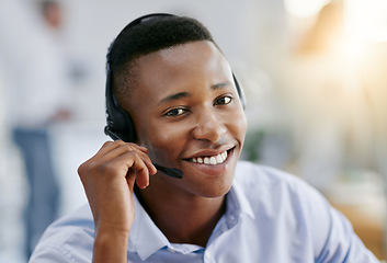 Image showing Communication, portrait or friendly black man in call center consulting or talking at customer services. Virtual assistant, happy smile or face of sales agent in telemarketing or telecom company