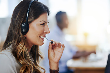 Image showing Communication, mic or happy woman in call center consulting, speaking or talking at customer services. Virtual assistant, friendly or sales consultant in telemarketing or telecom company help desk