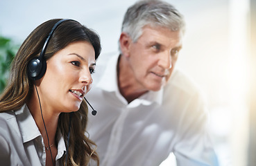 Image showing Coaching, woman or senior manager in call center training telemarketing in customer services office. Contact us, coaching or mature mentor teaching an insurance agent on new job advice on computer