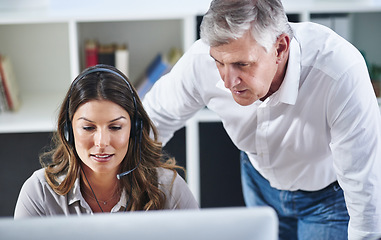 Image showing Mentor, woman or senior manager in call center training telemarketing in customer services office. Contact us, coaching or mature leader teaching an insurance agent on new job advice on computer