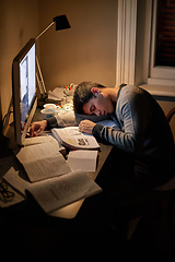 Image showing Student, books and sleep or studying late into the night on screen or sleeping on table and reading for examination.Tired, research and male scholar on computer or test paper fatigue at home