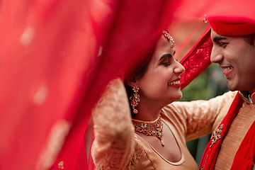 Image showing Celebration, young Indian married couple and dancing happy together. Happiness or commitment, love with relationship or marriage and smiling people dance at ceremony or special event with sari