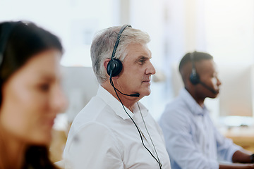 Image showing Virtual assistant, consultant or senior man typing in call center consulting at customer services help desk. Contact us, blurry or mature sales agent in telemarketing, crm or online telecom company