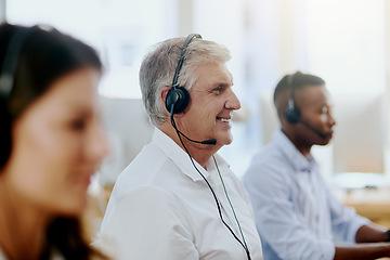 Image showing Virtual assistant, happy or senior man typing in call center consulting at customer services help desk. Contact us, blurry or friendly mature sales agent in telemarketing or online telecom company