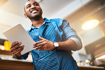 Image showing Happy, tablet and manager with man in cafe for online, entrepreneurship and startup. Smile, technology and food industry with small business owner in restaurant for barista, store and coffee shop