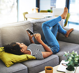 Image showing Weekend, phone and woman relax on sofa in home for network, online website and social media. Communication, mobile app and female person on smartphone for chat, text message and internet connection