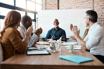 Image showing Business people, meeting and applause of black man in office for achievement, goal or target. Excited, clapping and senior African male professional with group of employees in celebration of success.