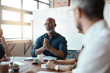 Image showing Business people, meeting leader and black man in office, talking or speaking. Teamwork, ceo and serious senior African male professional brainstorming, collaboration or planning group strategy