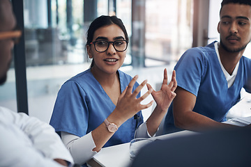 Image showing Healthcare, medical team in a meeting and talking in conference room. Medicine discussion or communication, teamwork or collaboration and doctors or nurses speaking about confidential patient data