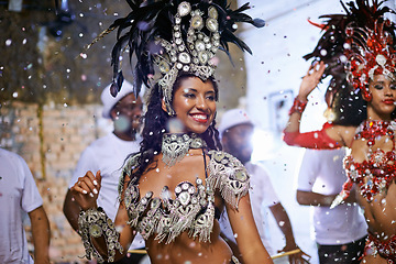 Image showing Carnival, woman and smile while dancing at party festival or event. Music or entertainment, dance competition or musical show and happy female dancer performing at night concert or celebrating in joy