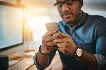 Image showing Night, business and man with a smartphone, typing and connection for social media, network or communication. Male person, employee or consultant with a cellphone, evening or texting to search website