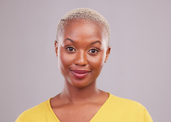 Image showing Face portrait, young and and a black woman with makeup isolated on a white background in a studio. Happy, cosmetic and an African girl with facial cosmetics, wellness and confidence on a backdrop