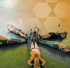 Image showing People, fitness and lying in circle for exercise, workout and training at gym. Athlete men and women group together for sports challenge, meditation or to rest on floor at wellness club with overlay