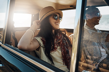 Image showing Happy couple, summer and on a road trip in a car for freedom, travel and holiday. Smile, relax and a young man and woman in transportation driving for a vacation, date or an adventure together